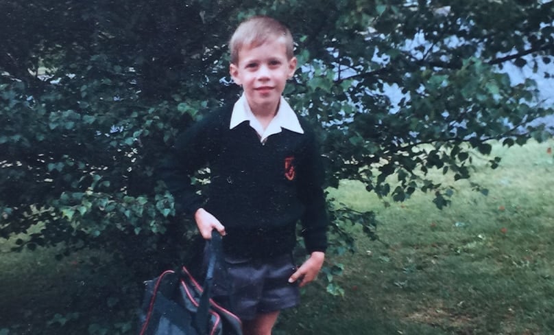 Adrian Beck in Year 1 at Corpus Christi Catholic Primary School in Bellerive, Tasmania, where he discovered his love of reading.