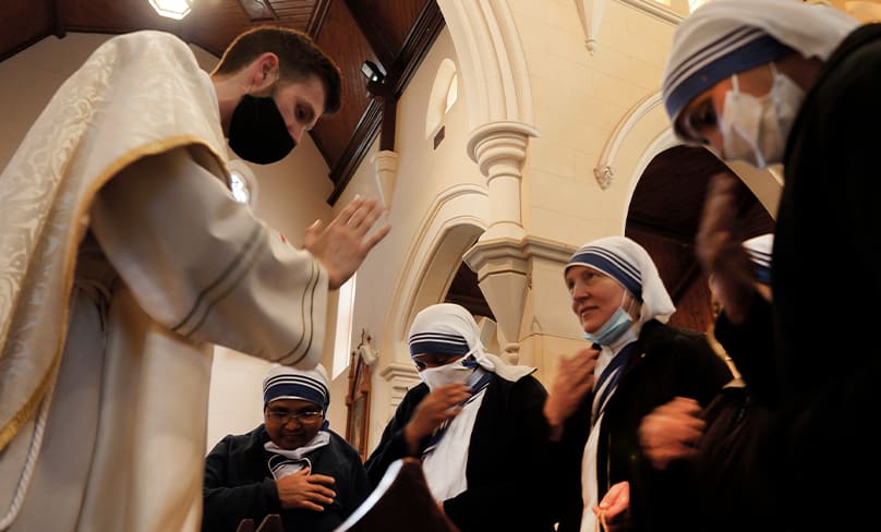 Fr Connell Perry with the Missionaries of Charity. Photo: Thomas Denahy