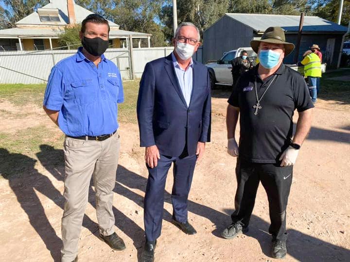 Bishop Columba Macbeth-Green with local MP Roy Butler, left, and NSW Health Minister Brad Hazzard, centre. Photo: Diocese of Wilcannia-Forbes