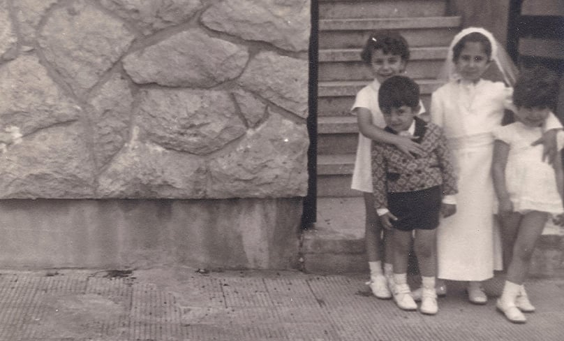 Ann-Marie Boumerhe's mum with her siblings on First Holy Communion.
