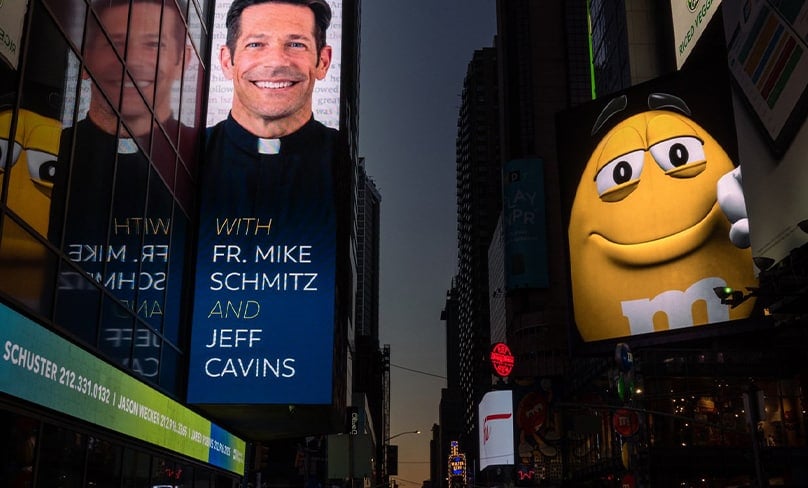A giant advertisement in Times Square, New York, promotes Fr Schmitz’s Number One podcast. Photo: CNS/Paul Haring