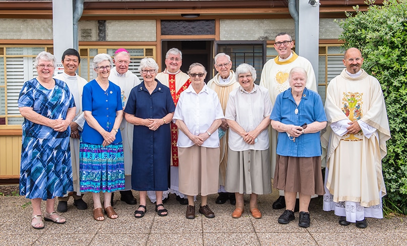 Sisters from Our Lady’s Nurses for the Poor and the Sisters of Charity with Sydney clergy after the Mass. Photo: Giovanni Portelli