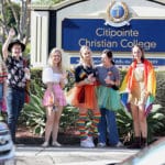 Supporters and members of the LGBTQI+ community stand outside Citipointe Christian College in Brisbane after the Christian College revised its student enrolment policy which included matters relating to gender and sexuality. Photo: AAP Image/Jono Searle