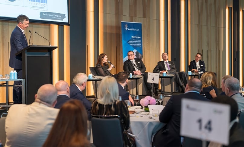 Niamh Mannion from the St Vincent de Paul Society makes a point during the Catholic Business Network lunch last week. Listening are fellow panel members Graham West from the End Street Sleeping Collaboration, left, Matthew Kearney, to right of Ms Mannion, Director of Mission with the St Vincent’s Health Network, Mark Phillips from CatholicCare and Dominic Sullivan from the Payce Foundation. Photo: Patrick J. Lee