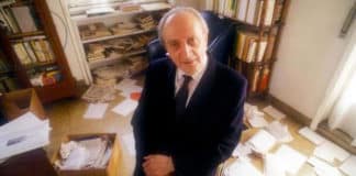 Brillliant - but not necessarily organised. This photo shows del Noce at home in his study surrounded by correspondence, papers and books. Photo: Marcello Mencarini, Bridgeman Images