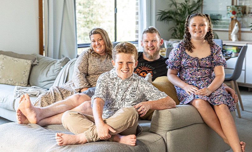 Footy, farmers and family are among Jack’s favourite things … the young entrepreneur at his Northern Beaches home with mum Prue, dad Mick and younger sister Ruby. Photo: Alphonsus Fok
