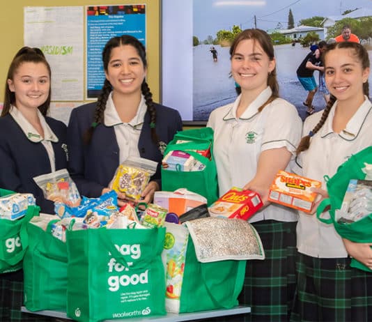 St Ursula’s College students with their donations collected by the school for the flood-devastated town of Lismore. Photo: Giovanni Portelli