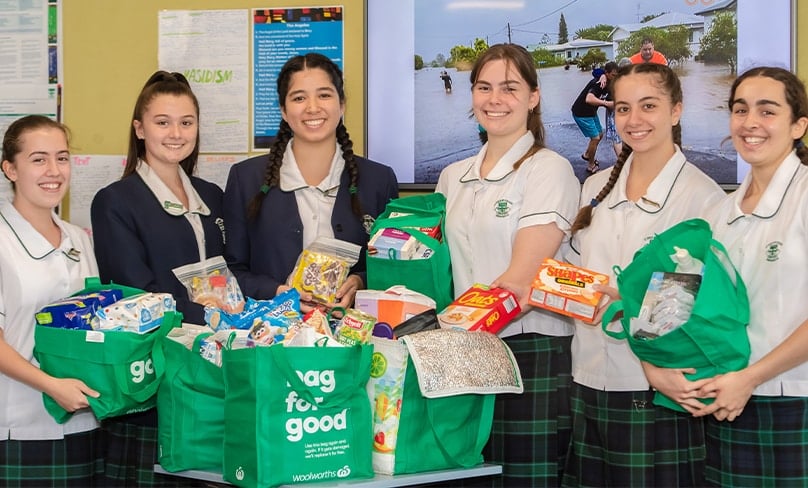 St Ursula’s College students with their donations collected by the school for the flood-devastated town of Lismore. Photo: Giovanni Portelli