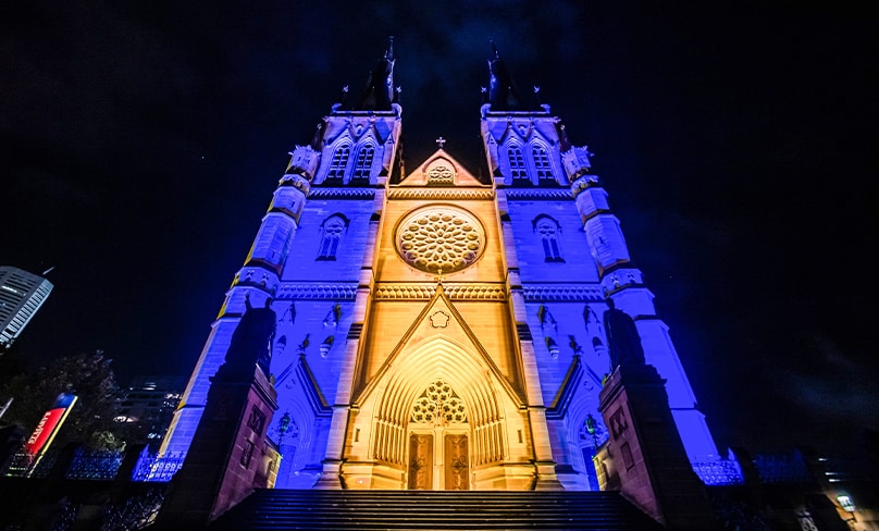 St Mary's Cathedral is lit up in the colours of the Ukrainian Flag. Photo: Giovanni Portelli