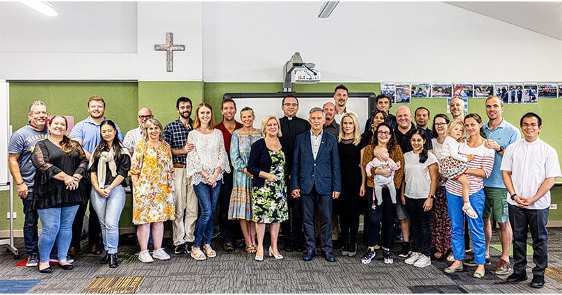 Scenes from an Aussie first: couples gather with Father Greg Skulski SDS after having elected to take leadership roles in the parish’s Domestic Church Movement program last week as the parish launched the new initiative. Photo: Alphonsus Fok
