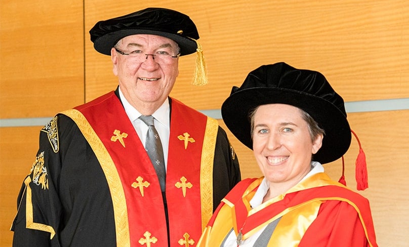 Robe ready … Sr Melissa Dwyer after being awarded ACU’s highest honour, an Honorary Doctorate, by Chancellor Martin Daubney AM QC. Photo: GFP Graduations
