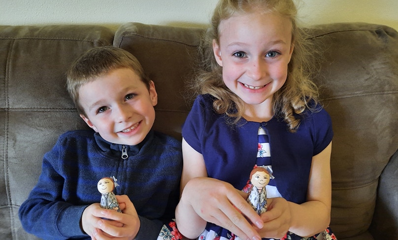 Justin and Julianna Carleton with their Eileen O'Connor dolls. Photo: Supplied