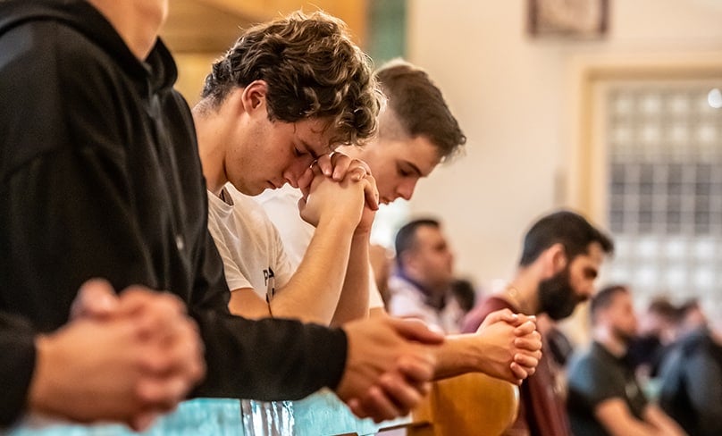 At stops along the way men of all ages prayed, availed themselves of the Sacrament of Reconciliation and adored the greatest man present in the Eucharist. Photo: Giovanni Portelli