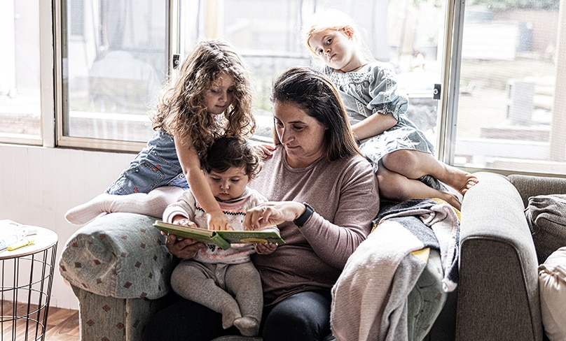 Deena Portelli with three of her young children. The couple say high taxation and rising living costs are affecting families. Photo: Alphonsus Fok