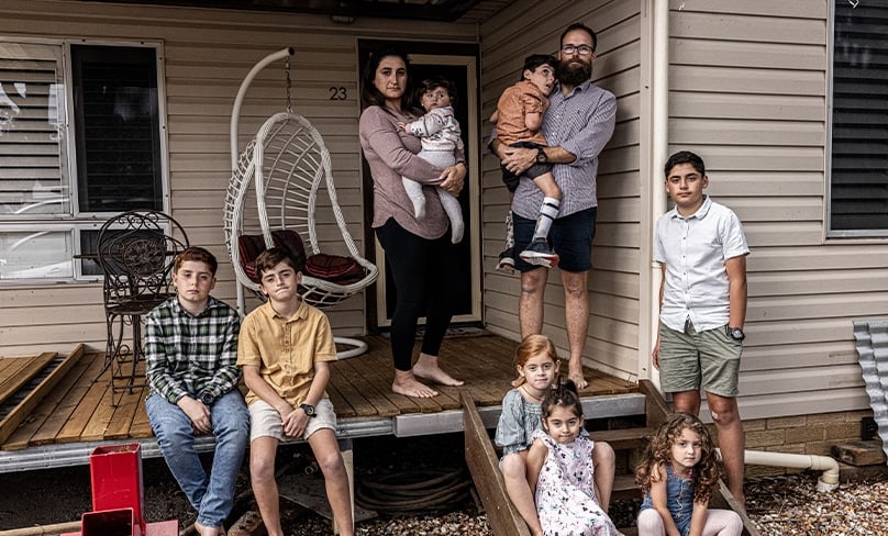 Deena and Joshua Portelli with their children at their home in Mt Druitt. Photo: Alphonsus Fok