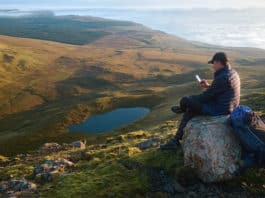 A hiker rests in the Scottish highlands. Travel and journeys are important - for the spirit and our outlook on life. Photo: 123rf