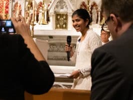 The smile says it all: a happy Adriel Moniz speaks to her family, friends and fellow Fraternas following her perpetual profession at St Mary’s Cathedral in Sydney last month. Photo: Caroline Adina