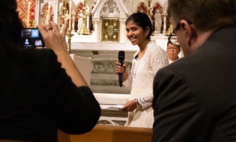 The smile says it all: a happy Adriel Moniz speaks to her family, friends and fellow Fraternas following her perpetual profession at St Mary’s Cathedral in Sydney last month.Photo: Caroline Adina