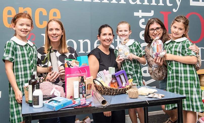 From left: Grace Smith and mum Georgie, Alanna and daughter Lola Nicols, Nicole and her daughter Aria Clancy. Photo: Giovanni Portell