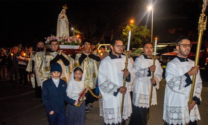 The procession followed the float of Our Lady, which was adorned with flowers and carried by four members of youth, with three young children from the parishes dressed as the three shepherd children of Fatima. Photo: Mathew De Sousa