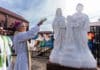 A 100-year milestone. Sydney Bishop Daniel Meagher blesses Holy Family Maroubra's new statue of its patrons last weekend. Photo: Patrick J. Lee