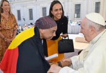 Theresa Ardler, a lecturer in Aboriginal Spirituality at ACU, meets Pope Francis last week. She presented him with a personal copy of the Uluru Statement from the Heart. Chiara Porro, Australia’s Ambassador to the Vatican, is centre of photo, and Jacqui Remond from ACU in the background. Photo: Vatican Media