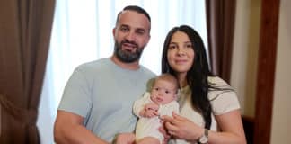 Danny and Leila Abdallah pose for a photo with 3-month-old Selina at the Domus Australia in Rome on 24 June. Photo: CNS, Robert Duncan