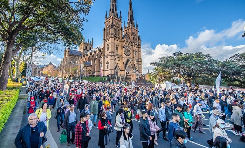 More than 13,000 people turned out to walk with Jesus through the streets of Sydney on the Feast of Corpus Christi - double the number who attended the last such procession. Photo: Giovanni Portelli