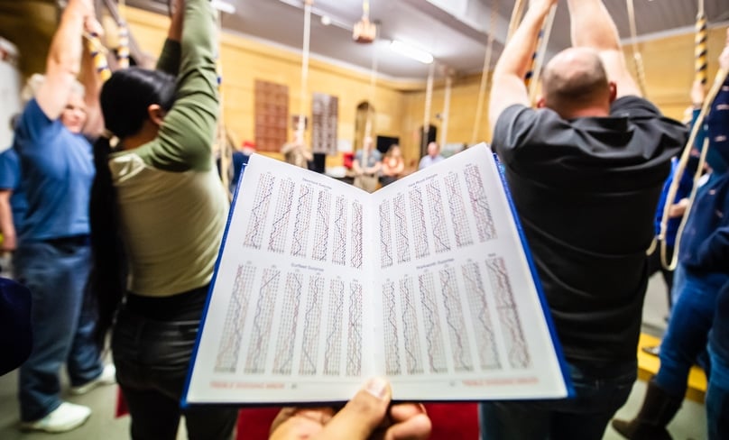 Campanologists read methods from charts commemorating great events of Church and State. Photo: Giovanni Portelli