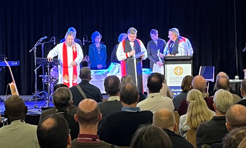 Bishop Glenn Davies is commissioned at the 2022 GAFCON Australia conference. Photo: David Ould