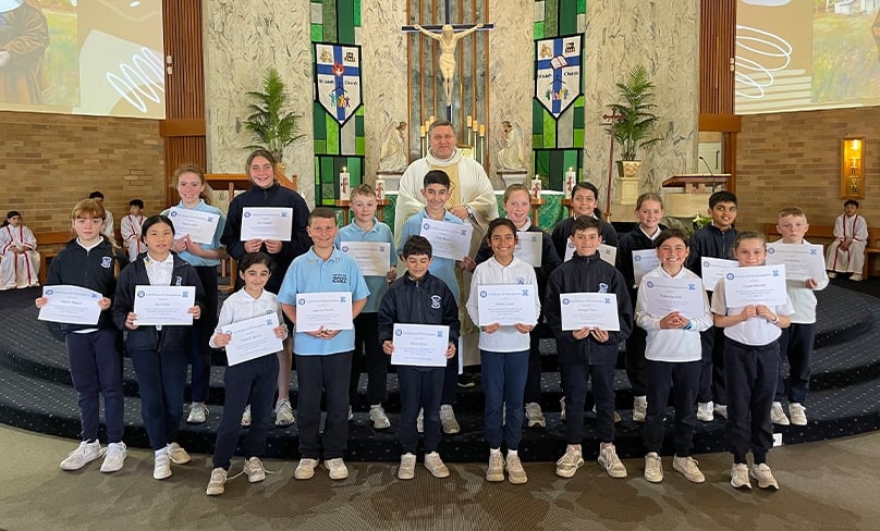 St Luke’s Revesby students with their Certificates from the Winter Sleep Out. Photo: Supplied