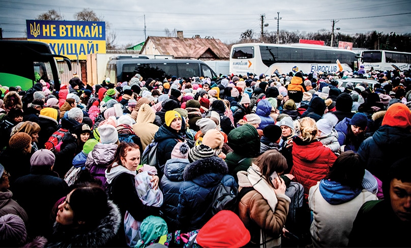Crowds gather in Lviv in western Ukraine of people preparing to escape into Poland on 8 March, 2022. Photos: ABC/Brendan Esposito