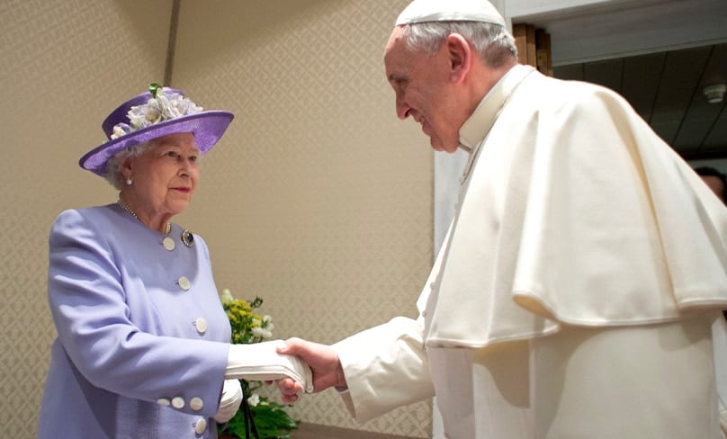 Pope Francis greets Britain's Queen Elizabeth II during a meeting at the Vatican in this April 3, 2014. Photo: CNS photo/Vatican Media via Reuters