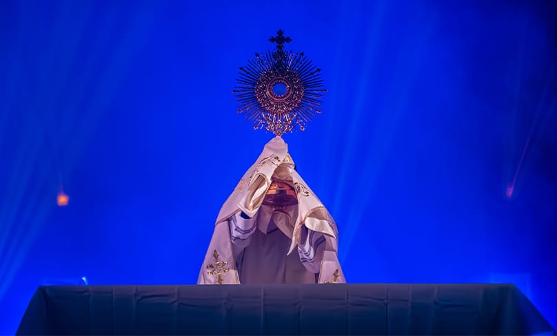 More than just a concert: Father Tony Alex MGL, blesses participants with the Son of God present in the Blessed Sacrament. Photo: Giovanni Portelli 