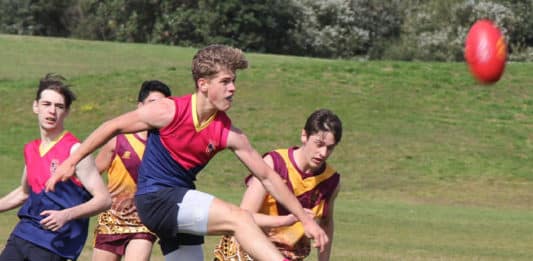Luca Micalletti (North Shore) drives forward in the Sydney Catholic Schools Interschool AFL Grand Final. Marist College crushed a valiant opposition in Holy Cross Ryde. Photo: Marist Catholic College North Shore