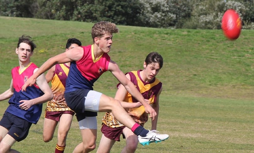 Luca Micalletti (North Shore) drives forward in the Sydney Catholic Schools Interschool AFL Grand Final. Marist College crushed a valiant opposition in Holy Cross Ryde. Photo: Marist Catholic College North Shore
