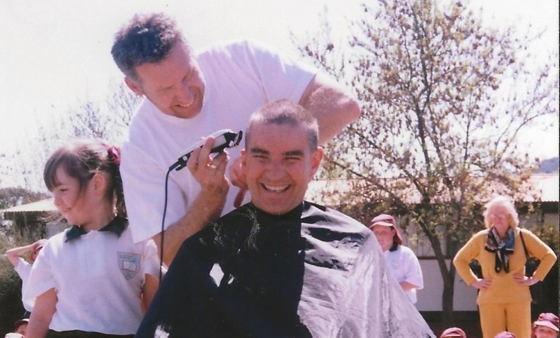 Paul Croker gets his head shaven for charity at St Anthony's, Canberra. Photo; Supplied