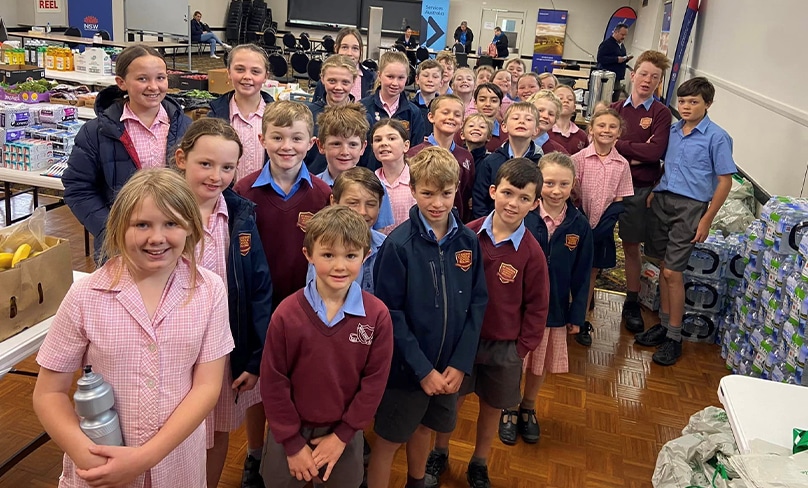 Students of St Joseph’s Primary in Molong visit the Recovery Centre to lend a hand. Photo: Supplied