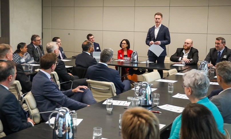 NSW Labor leader Chris Minns, standing, addresses religious leaders last week during the meeting with the state Shadow Cabinet. Shadow Minister for Small Business, Property and Multiculturalism, Steven Kamper, is seated at far right. Photo: Jack Begbie