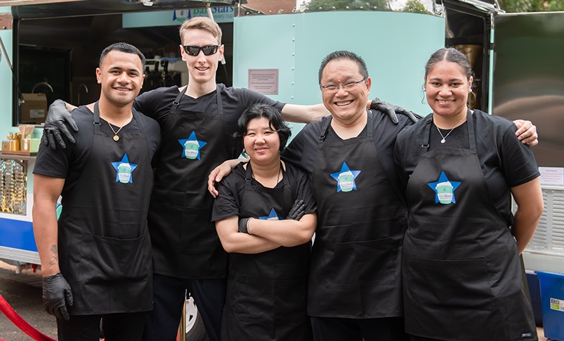 Freshly brewed and ready to go: CatholicCare Disability Educator TJ Masima, at left, joins Barista graduates Tom and Thuy and CatholicCare Disability Educators Ken So and Anastacia Tohi at the launch of the new coffee van. Photo: Giovanni Portelli