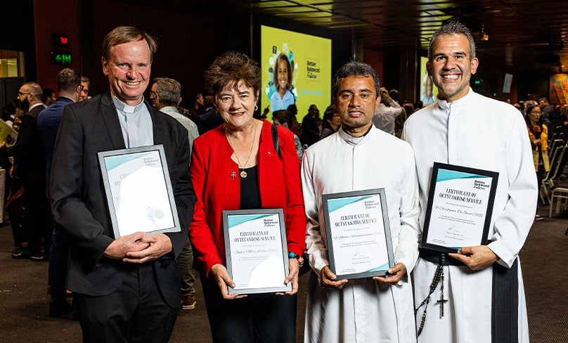 Four of the eight Catholics recognised on the evening are, from left, Fr Greg Morgan FMVD of Ryde-Gladesville Parish, Sr Mary Leahy RSJ and Somascan fathers Mathew Velliyamkandathil CRS and Christopher De Sousa CRS. Photo: Alphonsus Fok