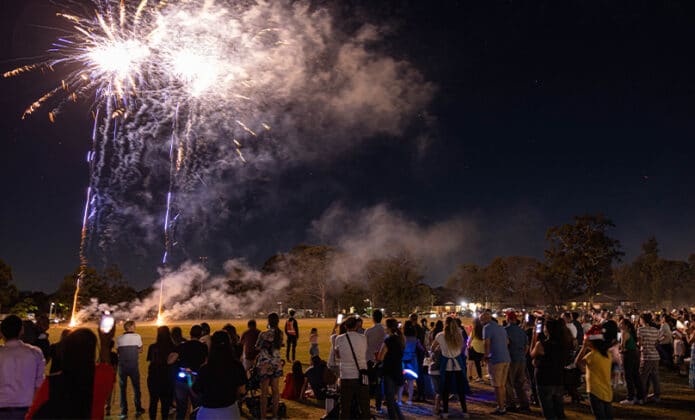 Crowds enjoy the fireworks after having processed around the parish and school grounds bearing a statue of the Mother of God. Photo: Alphonsus Fok