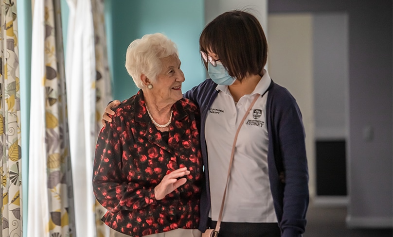 Mates: Bianca Albertin shares a moment with Katie Yung. Bianca is specific about her age: 91.5 years. Photo: Giovanni Portelli
