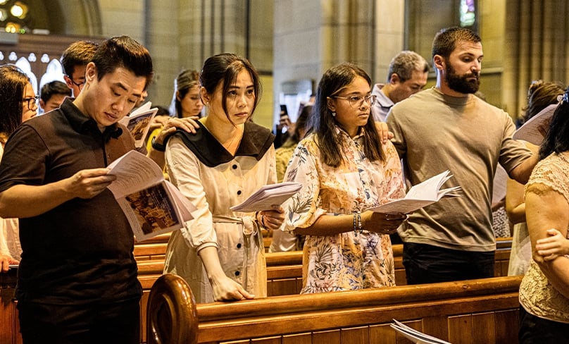 During the Rite of Election ceremonies in St Mary’s Cathedral on 26 February, candidates and catechumens were supported by both sponsors and godparents. Photo: Alphonsus Fok