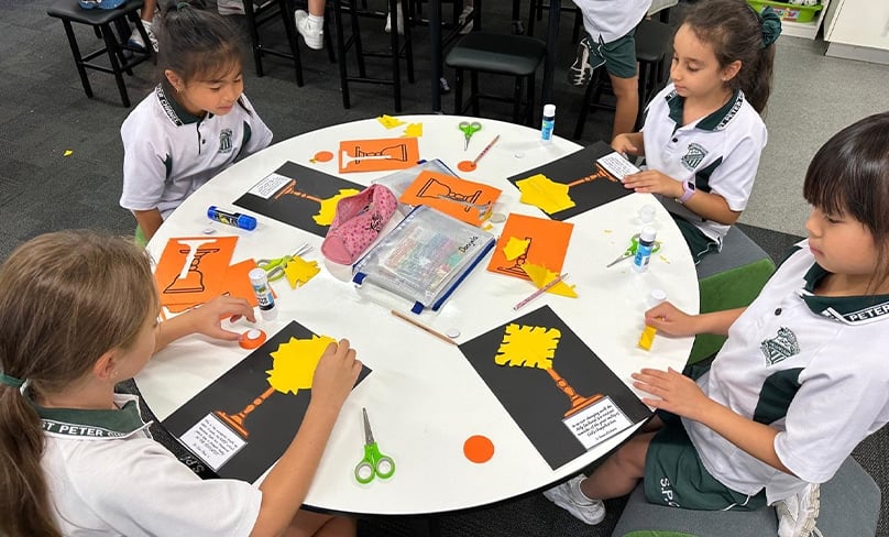 Students also took part in craft activities, including making a cut-out monstrance. Photo: Supplied