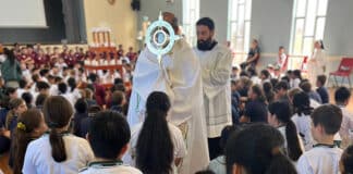 Based on a US faith rally model for primary students, students learned about the real presence of Christ in the Eucharist.