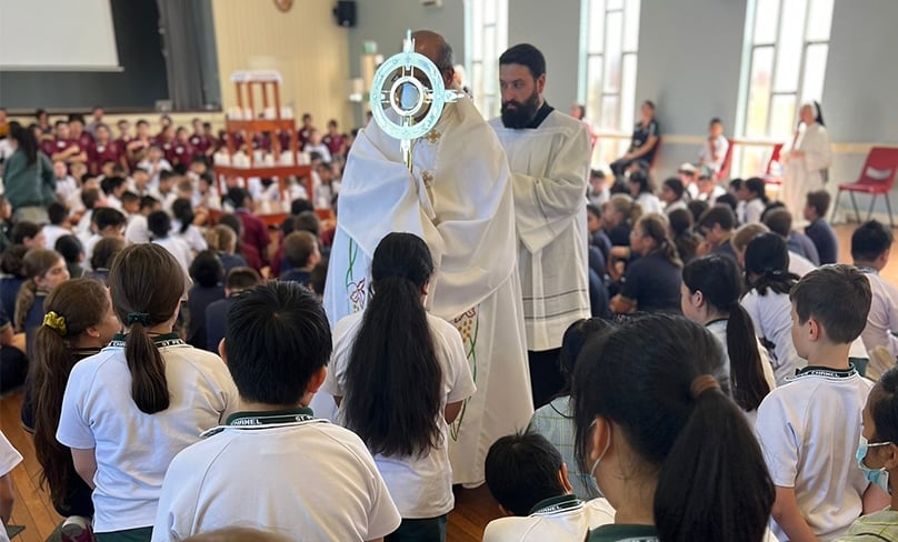 Based on a US faith rally model for primary students, students learned about the real presence of Christ in the Eucharist.