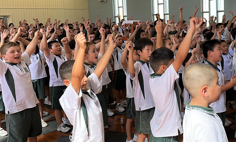 St Peter Chanel Primary School at Regents Park was joined by students from St Joseph the Worker Primary, South Auburn, and St Joan of Arc Primary, Haberfield, for a day of faith, fun and family. Photo: Supplied