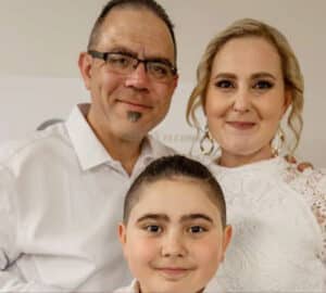 Nicholas Tadros with his father Simon and his late mother Vanessa. Photo: Supplied