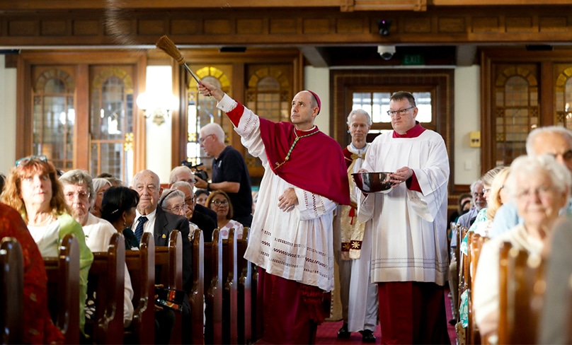 Bishop Michael Kennedy sprinkles Holy Water over the congregation at his installation as bishop on 17 March. Photo: Diocese of Maitland-Newcastle